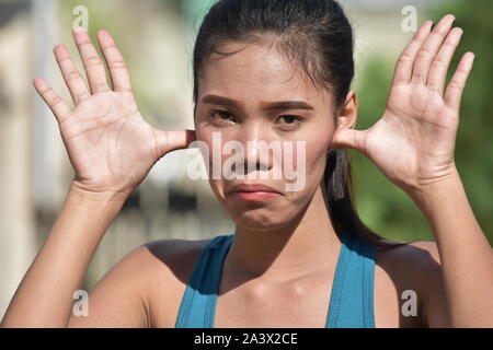 Filipina Weiblich, lustige Gesichter Stockfoto