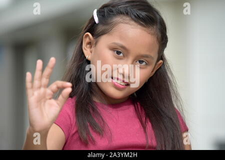 Süße Asiatische Jugendliche und kleine Stockfoto