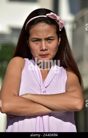 Hartnäckige junge Filipina Weiblich Stockfoto