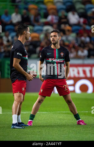 Cristiano Ronaldo und Bernardo Silva von Portugal Aufwärmen vor der Qualifikation für die Fußball-Europameisterschaft 2020 Match zwischen Portugal vs Luxemburg. (Endstand 3:0; Portugal Luxemburg) Stockfoto