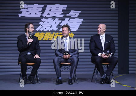 Amerikanische Regisseur David Leitch, Mitte, besucht eine Pressekonferenz für neuen Film 'Fast & Furious präsentiert: Hobbs & Shaw" in Peking, China, 5. Aug. Stockfoto