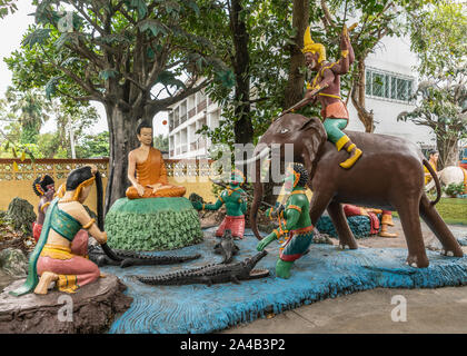 Bang Saen, Thailand - 16. März 2019: Wang Saensuk buddhistischen Kloster. Gruppe von bunten Skulpturen, Buddha, Siddhattha und besiegte die Truppen Stockfoto