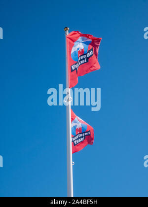 Fahnen mit dem eierland Leuchtturm auf der Insel Texel in den Niederlanden. Stockfoto