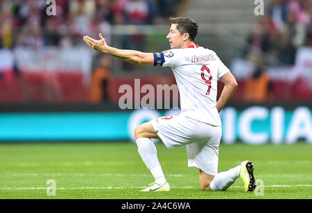 Warschau, Polen. 13 Okt, 2019. Robert Lewandowski von Polen reagiert während der UEFA EURO 2020 Qualifikation Gruppe G Match zwischen Polen und Mazedonien in Warschau, Polen, Okt. 13, 2019. Credit: Rafal Rusek/Xinhua/Alamy leben Nachrichten Stockfoto