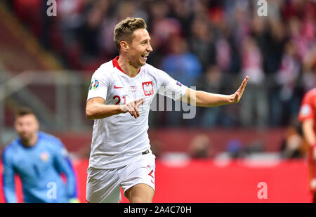 Warschau, Polen. 13 Okt, 2019. Przemyslaw Frankowski von Polen feiert während der UEFA EURO 2020 Qualifikation Gruppe G Match zwischen Polen und Mazedonien in Warschau, Polen, Okt. 13, 2019. Credit: Rafal Rusek/Xinhua/Alamy leben Nachrichten Stockfoto