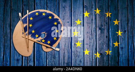Holz- künstler Palette beladen mit europäischen Flagge Farben und Pinsel über die europäische Flagge Tabelle - Konzept für Brexit Stockfoto