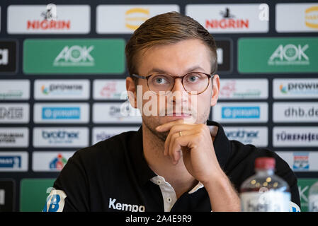 Hannover, Deutschland. 14 Okt, 2019. Die nationalen Handball Spieler, Fabian Böhm, Gespräche während der Pk über das Länderspiel gegen Kroatien, sowie der Tag der Handball. Credit: Peter Steffen/dpa/Alamy leben Nachrichten Stockfoto