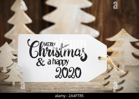 Weihnachtsbaum, Label mit englischem Text frohe Weihnachten und ein glückliches Jahr 2020 Stockfoto