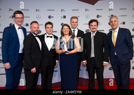 Berlin, Deutschland. 13 Okt, 2019. Preis gewinner Calmus Ensemble präsentiert seine Preis, Kategorie Chormusik Aufnahme, Preisverleihung des Opus-Klassik 2019 durch den Verein zur Förderung der Klassischen Musik eV und das ZDF, im Konzerthaus Berlin am 13.10.2019. | Verwendung der weltweiten Kredit: dpa/Alamy leben Nachrichten Stockfoto