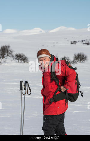 Ältere Frau Langlauf Stockfoto