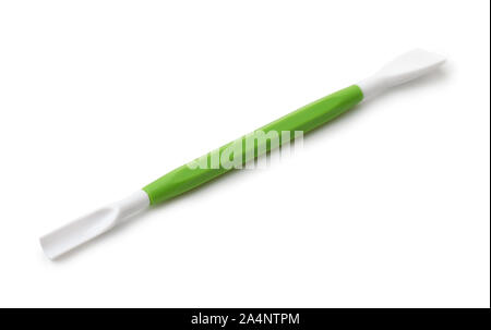 Grün Kunststoff doppelseitige Modeling Tool isoliert auf weißem Stockfoto