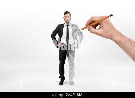 Kaufmann in der linken Hälfte reale Menschen und das rechte Bild, Zeichnung von Hand Stockfoto