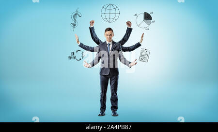 Ein Geschäftsmann mit viele Hände mit Bildern von Diagrammen, Daten und Statistiken umgeben. Stockfoto