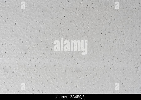 Weiß abstract Styropor Hintergrund Textur close-up Detail anzeigen. Polystyrol, Styropor, Kunststoff Blatt abstrakte synthetische Verpackungsmaterial. Stockfoto