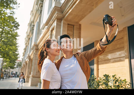 Touristen fotografieren sich selbst Stockfoto