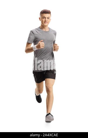 In voller Länge Porträt einer jungen Kerl joggen auf die Kamera auf weißem Hintergrund Stockfoto