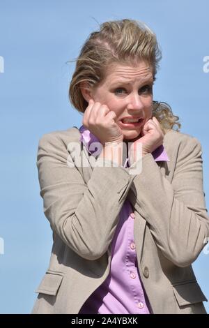 Ängstlich Business Woman tragen Anzug Stockfoto