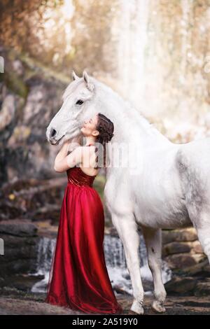 Frau und German Riding Pony Stockfoto