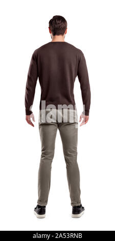 Eine Rückansicht auf einem modernen locker und leger gekleidete Mann, steht in einer entspannten Haltung völlig gerade. Stockfoto