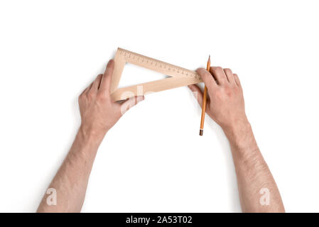 Close-up Hände des Menschen während der Arbeit mit Dreieck zentimeter Herrscher. Stockfoto