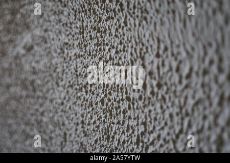 BAcvkground Textur mit einer Wand mit geprägtem Lackierung, Bilder mit schmalen Bereich der Fokus Stockfoto