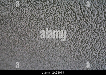 BAcvkground Textur mit einer Wand mit geprägtem Lackierung, Bilder mit schmalen Bereich der Fokus Stockfoto
