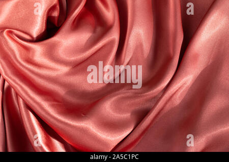 Braun leuchtende Seide Satin Textur Hintergrund Stockfoto