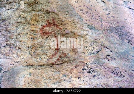 Rock Kunst Malerei eines sitzenden Giraffe prähistorischen Naive Kunst UNesco Weltkulturerbe Botswana Afrika Stockfoto