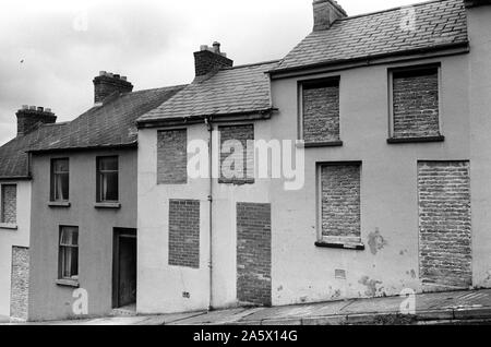 Die Probleme der 1970er Jahre Derry in Nordirland Londonderry. 1979. Zugemauert Häuser, im Bereich der Wasserseite. Protestantische Familien Straßen. Häuser sind verlassen und stieg als Familien aufgrund von sektiererischen Gewalt verschoben. 70 s HOMER SYKES Stockfoto