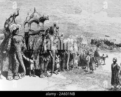 Status Eintrag der Prince Of Wales (später König Edward VII) in Lahore, während seiner Reise durch Indien (und Pakistan) 1876. Indische Prinzen auf geschmückten Elefanten säumen den Weg. Stockfoto