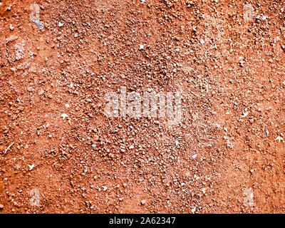 Orange sand closeup. Sand Textur. orange Laufband Stockfoto