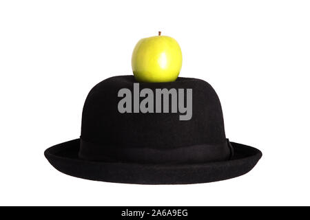 Ein grüner Apfel auf eine Melone Konzept Stockfoto