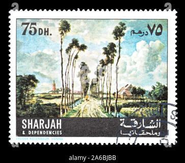 Storniert Briefmarke gedruckt von Sharjah, das zeigt Malerei Allee von Middelharnis, von Meindert Hobbema, circa 1967. Stockfoto