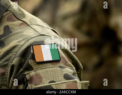 Flagge Elfenbeinküste oder Cote d'Ivoire, die auf Uniform. Armee, Soldaten, Soldaten, Afrika, (Collage). Stockfoto