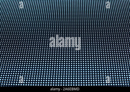 Abstrakte dunkel gepunkteten Textur Hintergrund, blaue Neonlicht dots auf schwarzem Hintergrund, dekorative helle Polka Dot ornament Geometrische parallele Linien Muster Stockfoto