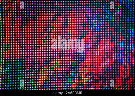 Abstrakte bunte Flecken übersät Textur Hintergrund, viele Rot, Blau, Grün, Schwarz Neon Licht runden Punkte Kulisse, dekorative Blumen Ornament, Muster Stockfoto