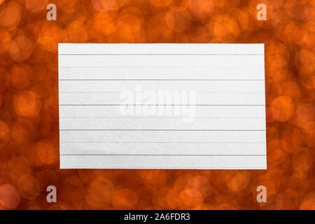 Leeres Papier mit orange bokeh Frame, Wunschliste Konzept, Raum für Text oder Nachricht Stockfoto