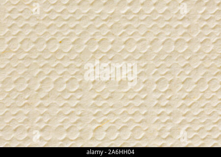 Beige Papier stanzen Textur. Kraftpapier mit vertikalen Linien, makroaufnahme. Stockfoto