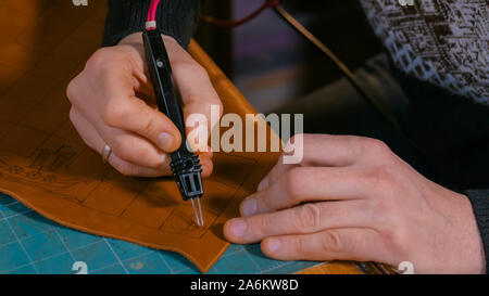 Skinner, dekorative Details auf Leder Wettbewerbsbedingungen Stockfoto