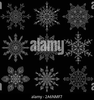 Satz von gezeichnet Schneeflocke Silhouetten Stock Vektor