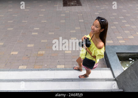 Junge schöne touristische Frau Erkundung der Stadt Bangkok. Stockfoto