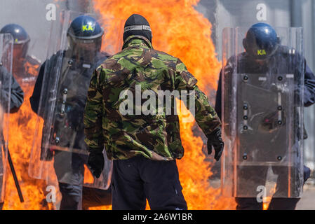 Britische Polizei Ausschreitungen während der Aktion in London. Stockfoto