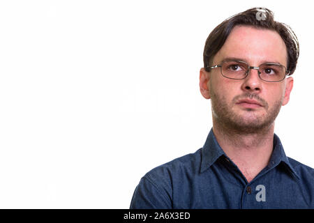 Studio shot der formalen jungen Mann denken Stockfoto