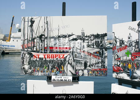 Kunstwerke zum Verkauf neben dem Hafen in St. Tropez, Frankreich Stockfoto