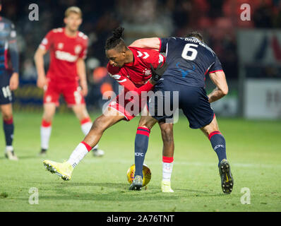 Förster Joe Aribo (links) und Ross County Ross Draper während der Ladbrokes schottischen Premiership Gleiches an Global Energy Stadion, Dingwall. Stockfoto