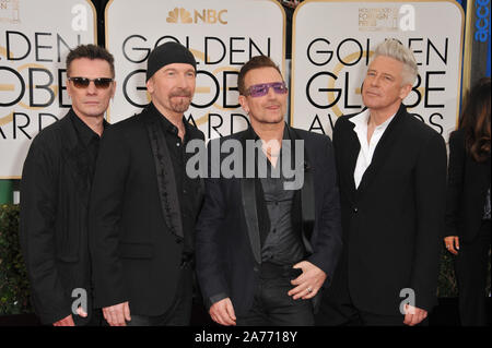 LOS ANGELES, Ca - 12. JANUAR 2014: U2 mit Bono & Edge auf der 71st jährlichen Golden Globe Awards im Beverly Hilton Hotel. © 2014 Paul Smith/Featureflash Stockfoto