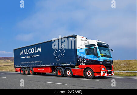 Malcolm Logistik LKW. Autobahn M6 Richtung Süden, Shap, Cumbria, England, Vereinigtes Königreich, Europa. Stockfoto