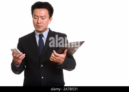 Studio shot der Japaner vor weißem Hintergrund Stockfoto