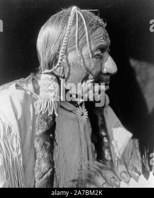 Edward S. Curits Native American Indians - Esipėrmi - Comanche Mann kann. 1927 Stockfoto