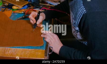 Skinner, dekorative Details auf Leder Wettbewerbsbedingungen Stockfoto